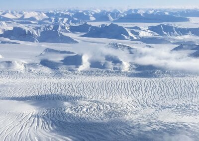 Snowcovered mountain landscape at Svalbard photographed from the air